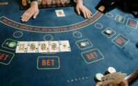 Cards and Casino Tokens on Baccarat Table